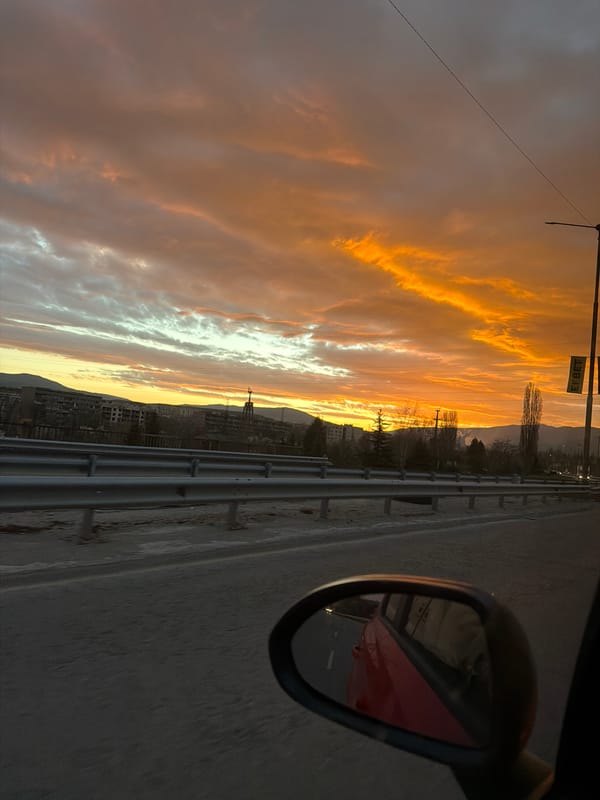 Driver captures sunrise views while traveling through Pernik, Bulgaria