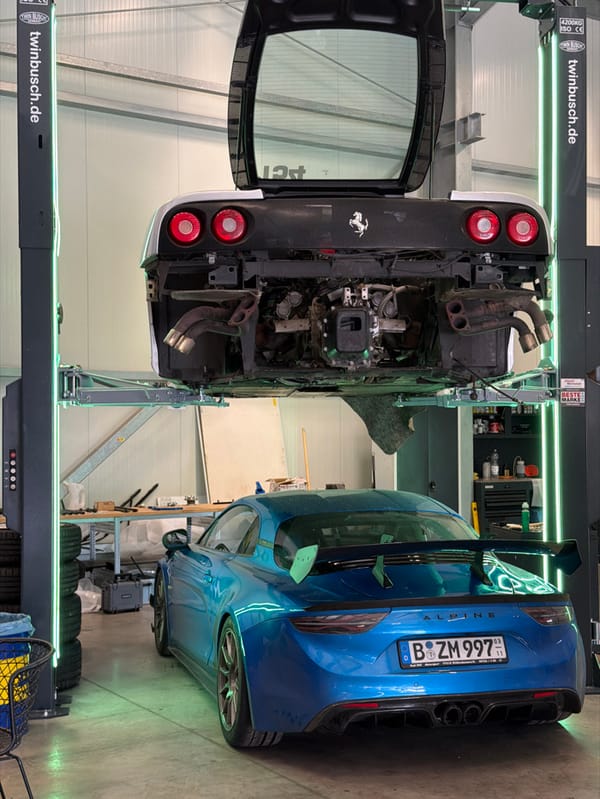Luxury sports cars serviced at German automotive workshop