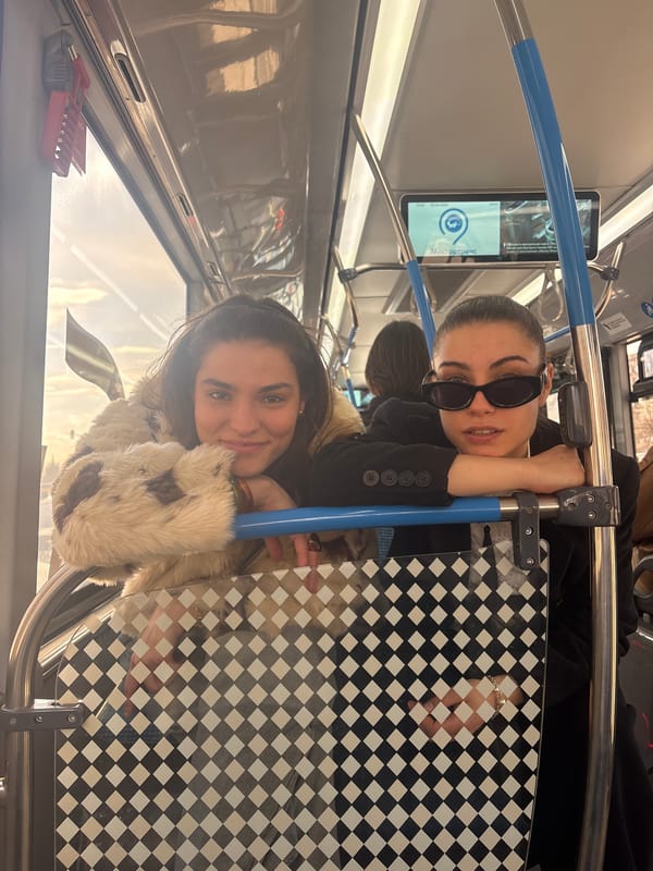 Two women ride Moscow Metro train Friday afternoon