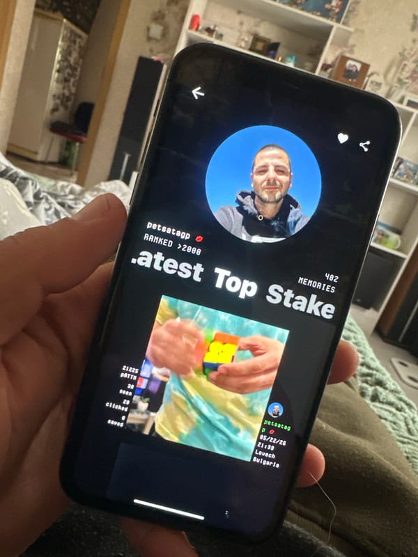 Smartphone user views profile app in Bulgarian village