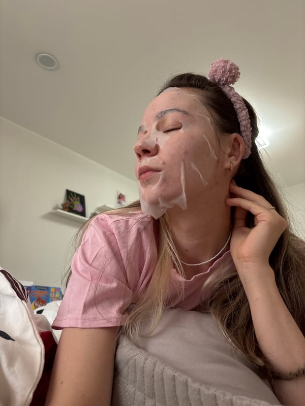 Woman performs skincare routine with face mask in Izhevsk