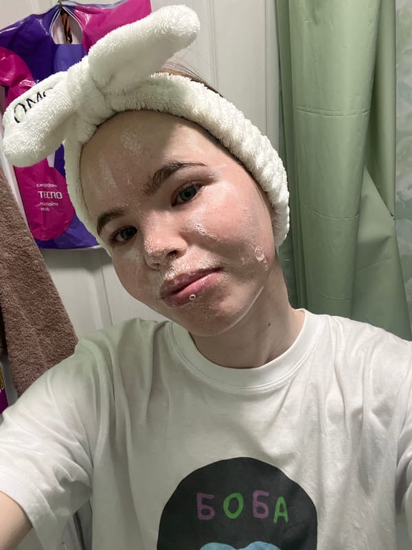 Woman documents early morning skincare routine in Russian bathroom selfies