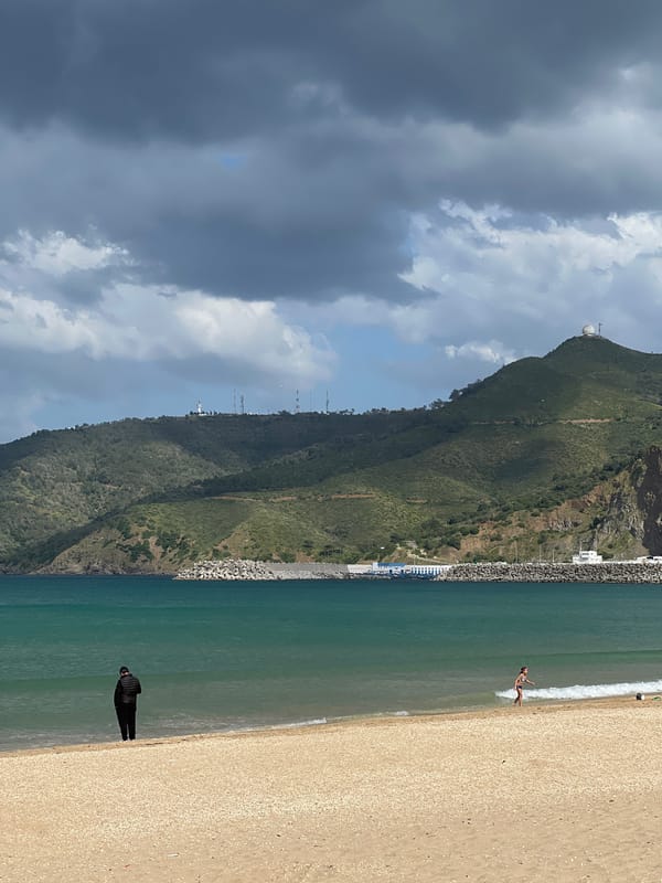 Beachgoers enjoy afternoon at M'Diq despite stormy skies