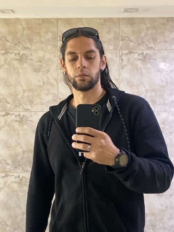 Man takes bathroom selfie, colorful bar spotted in Buenos Aires