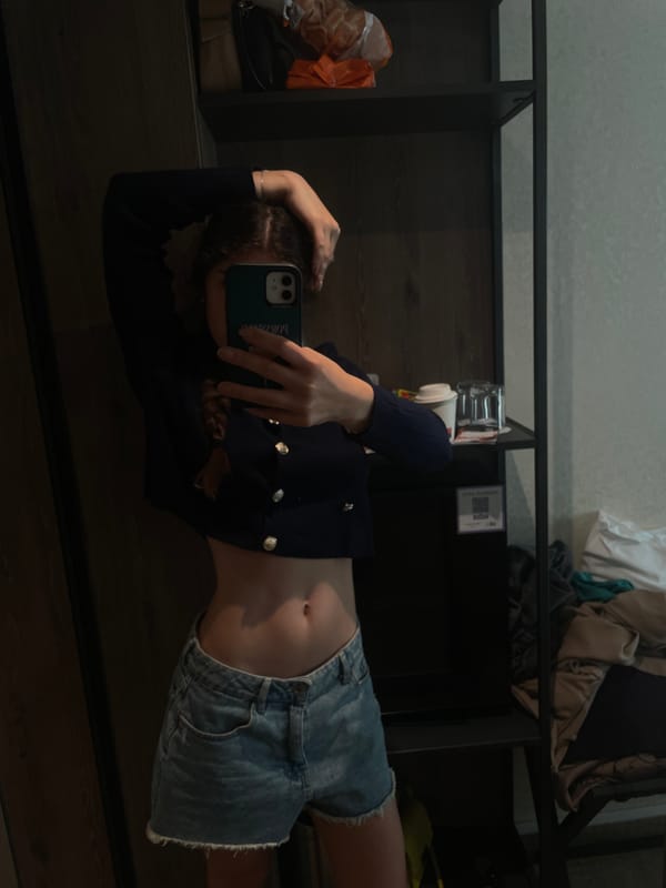 Mirror selfie session at a Budapest hotel, June 2026