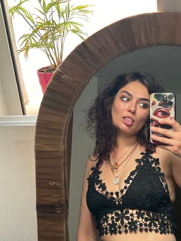 Woman documents afternoon with selfies, landmarks in Picassent, Spain