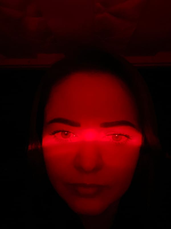 Dramatic red-lit portrait session captured in Yekaterinburg