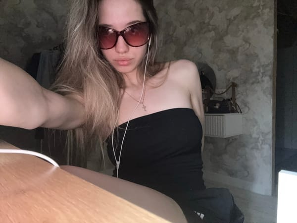 Woman Takes Upside-Down Selfie in Noviy, Russia Bedroom