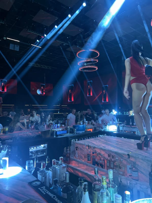 Woman dances on bar at Plovdiv nightclub
