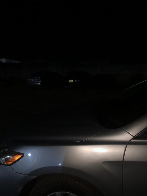 Individual documents evening drive to nighttime social venue