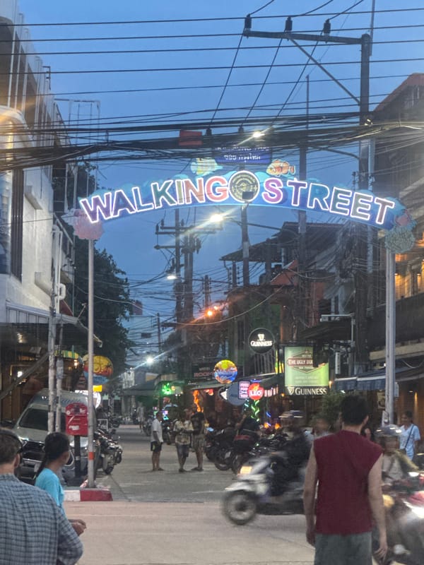 Neon lights illuminate Walking Street in Ko Pha-ngan, Thailand