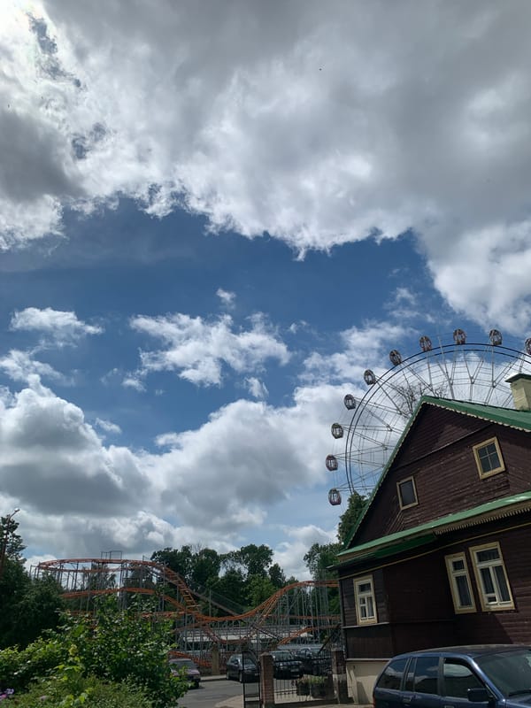 Amusement park captured under partly cloudy skies in Hrodna
