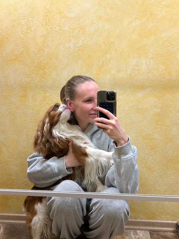 Resident shares affectionate moment with dog in Перепечино home