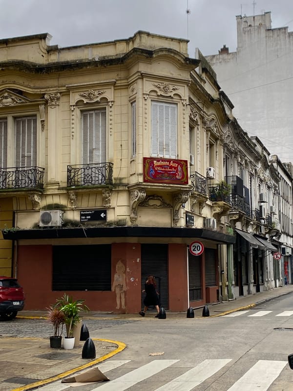 Woman takes selfie in illuminated mirror in Buenos Aires