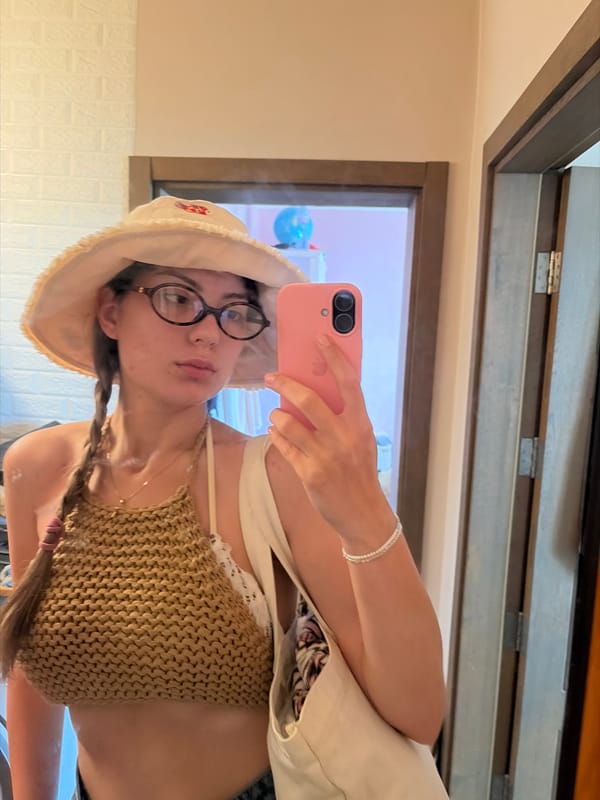 Woman takes car selfies in Tsarevo, Bulgaria morning commute