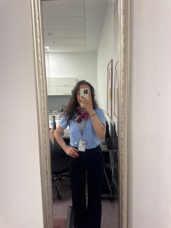 Woman takes mirror selfie in uniform in Burgas