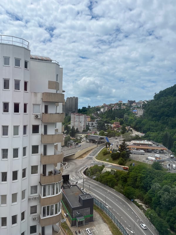 Morning stroll through residential Sochi neighborhoods with urban views