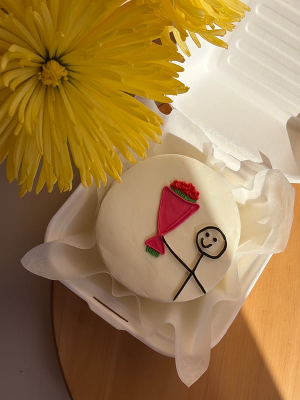 International Women's Day cake spotted in Tel Aviv takeout container