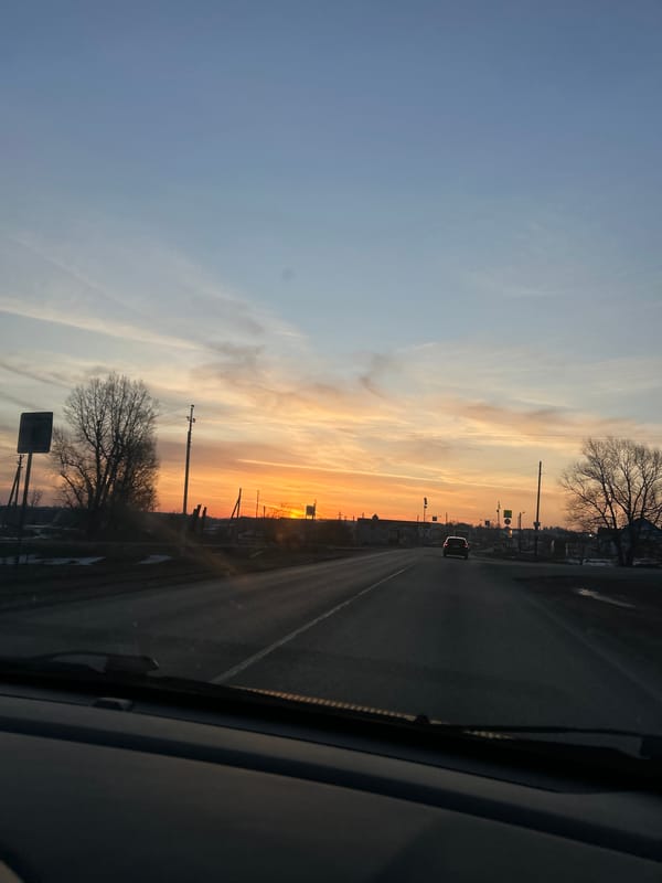 Sunset captured from street and vehicle in Гаревая, Russia