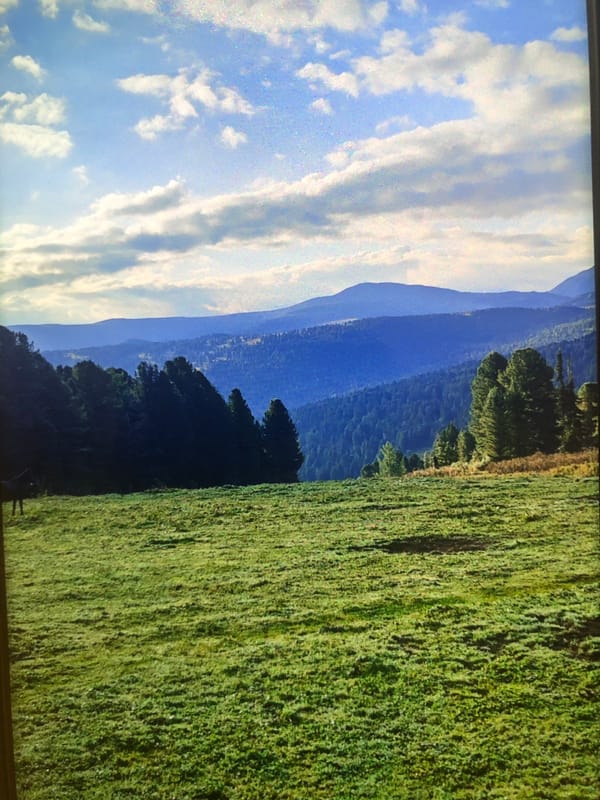 Mountain camping and horseback activities documented across unknown terrain