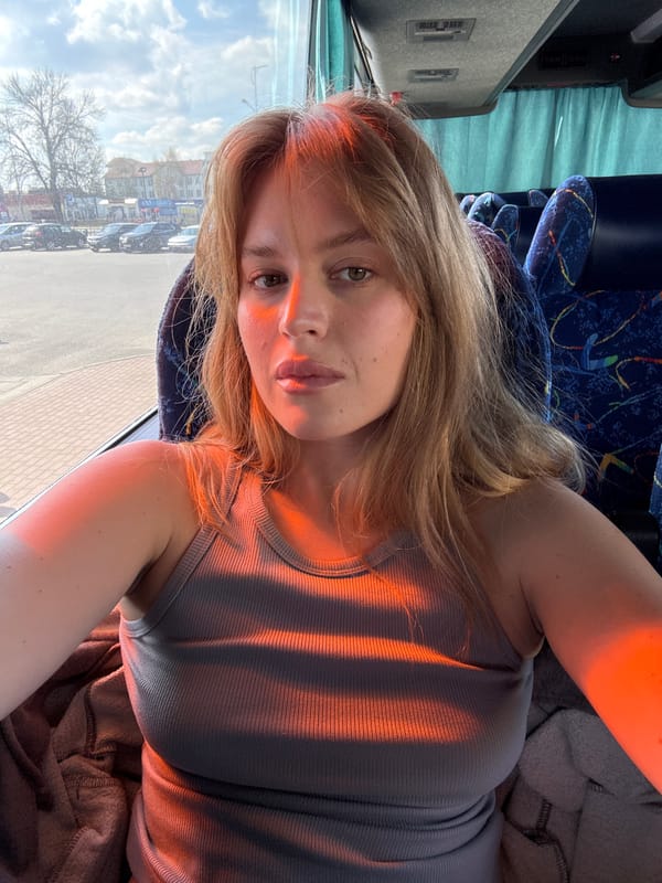 Woman takes selfie on morning bus ride in Lida