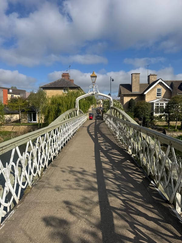 Sunlit pedestrian bridge photographed in South Kesteven, UK