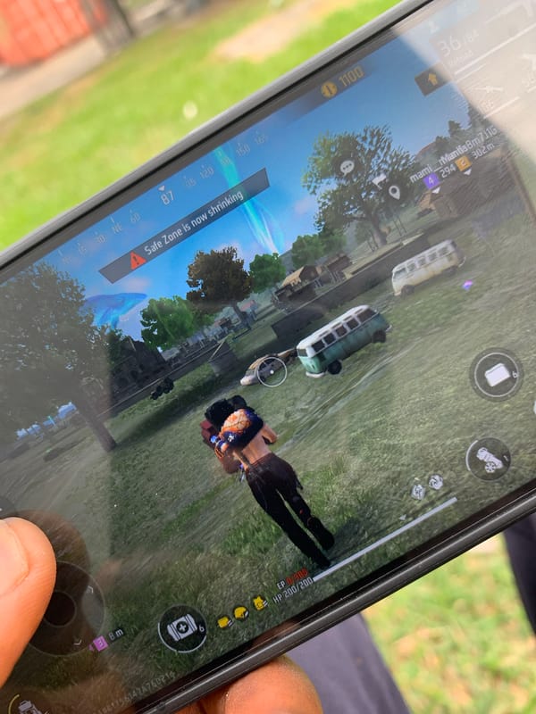 Mobile gaming session documented across Lagos suburbs