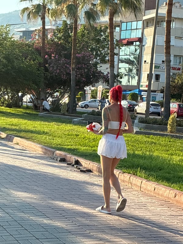 Busy summer afternoon on Alanya's beach and streets