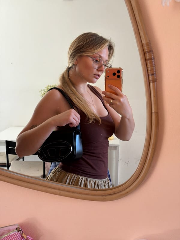 Woman poses for photos in Tel Aviv apartment
