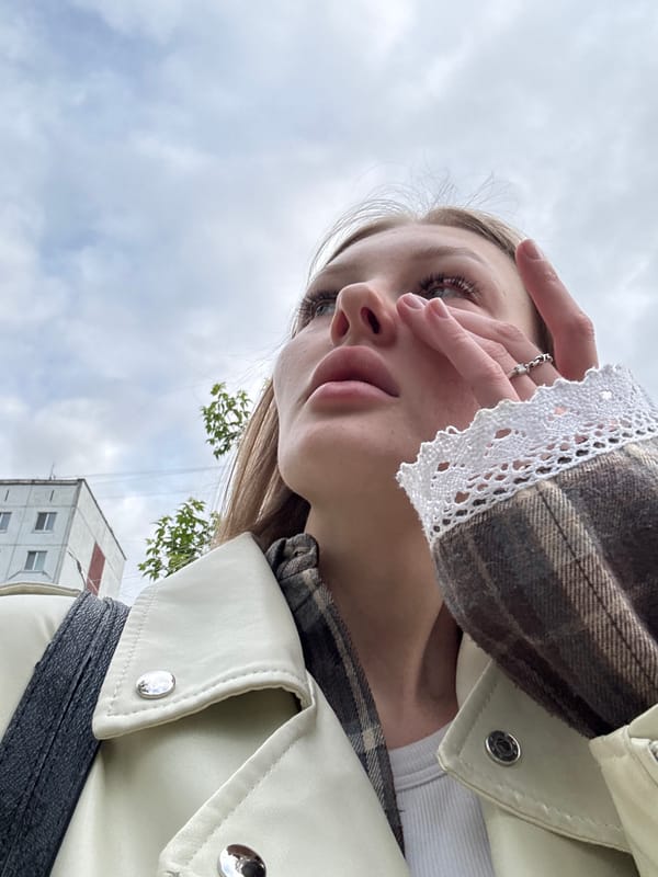 Young woman takes multiple selfies in Perm, Russia