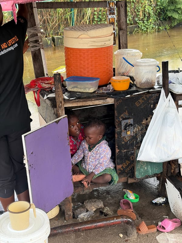 Rainy morning in Igboefon: street scenes and stone monuments