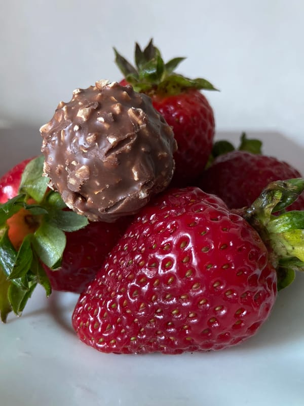 Strawberries and chocolate photographed in artistic food arrangement