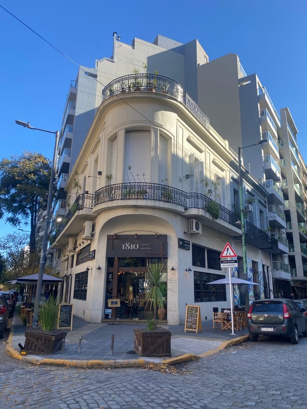 Buenos Aires street scene featuring 1810 Cocina Regional restaurant documented
