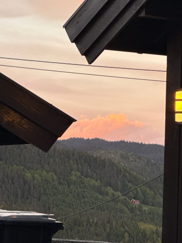 Vibrant sunset over residential Åmot, Norway from multiple perspectives