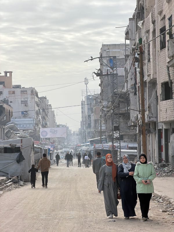 Daily life continues amid damaged Gaza City streets