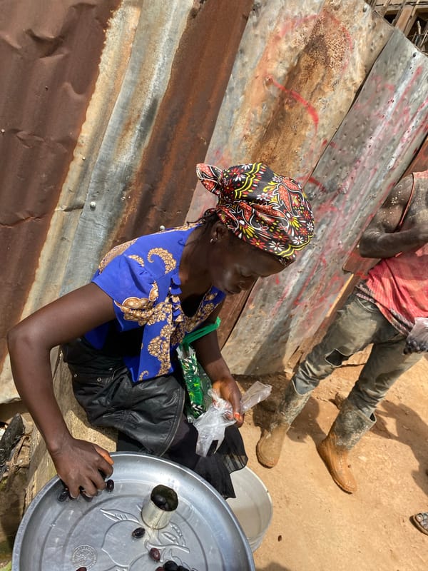 Street market hustle in Bukuru, Nigeria on a weekday morning