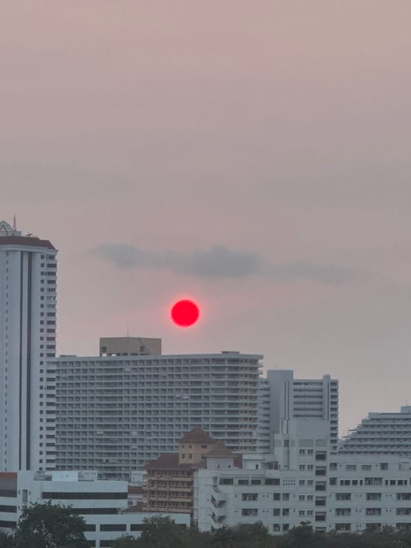 Striking red sun phenomenon observed over Pattaya City Thailand
