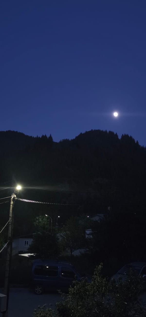 Full moon observed over Rudozem, Bulgaria residential area