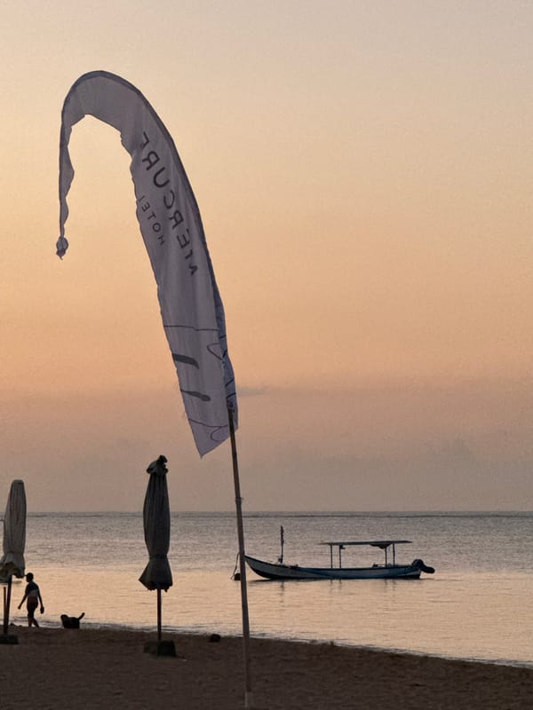 Sunset beach evening captured in Denpasar, Indonesia