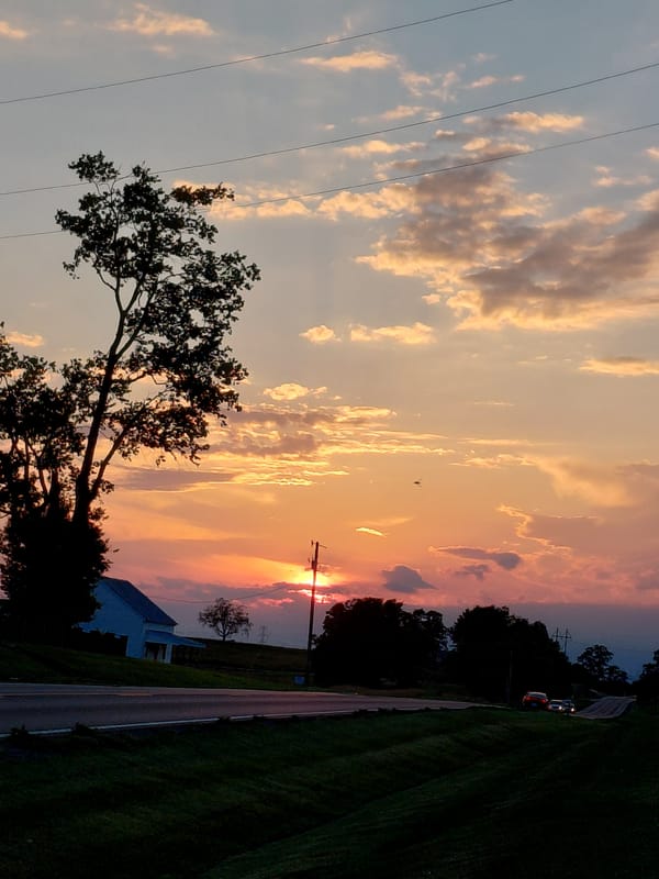 Sunset over a quiet rural road near Lancaster, Kentucky