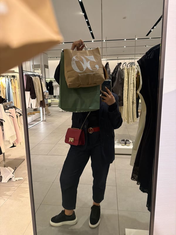 Shopper takes selfies near jewelry stores in Yerevan mall