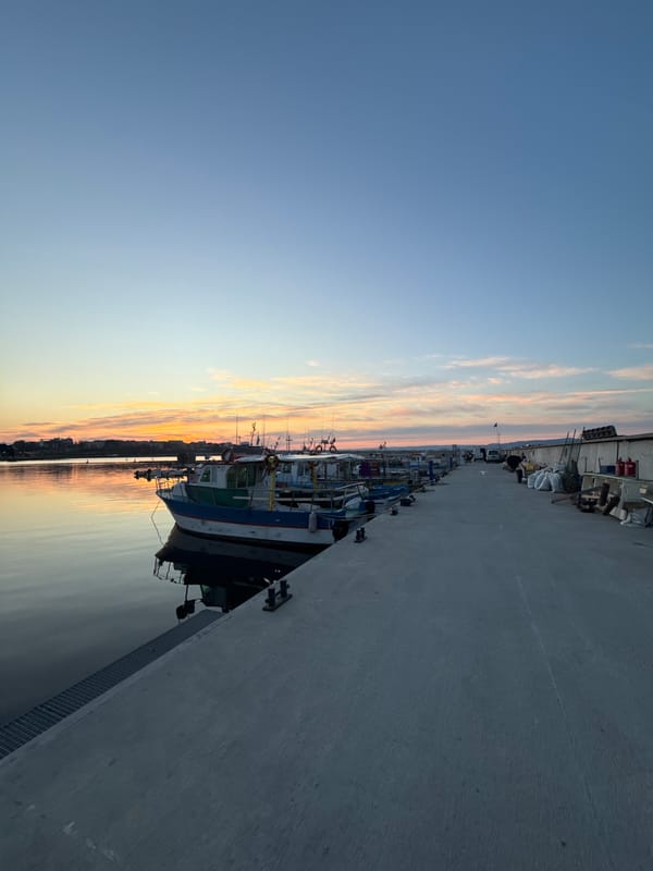 Sunset documented across historic Nesebar waterfront and streets
