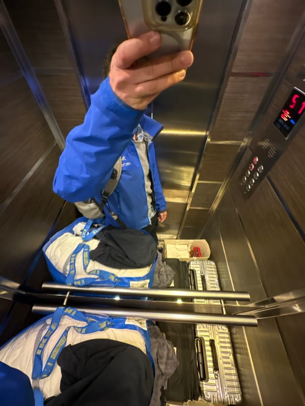 Milan residents document luggage-filled elevator and piled suitcases