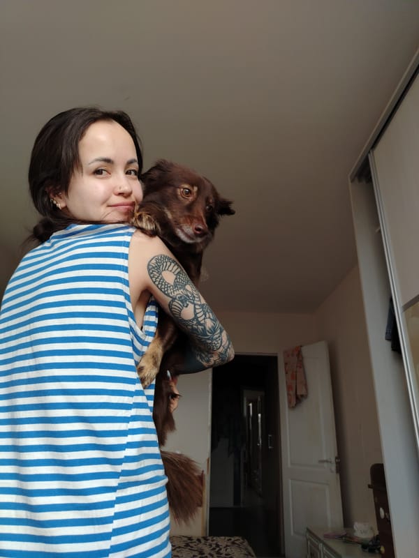 Woman documents quiet afternoon moments with dog in Noviy