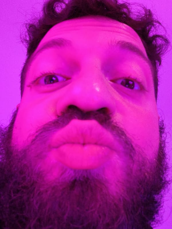 Bearded man photographed on bed in Diepholz, Germany