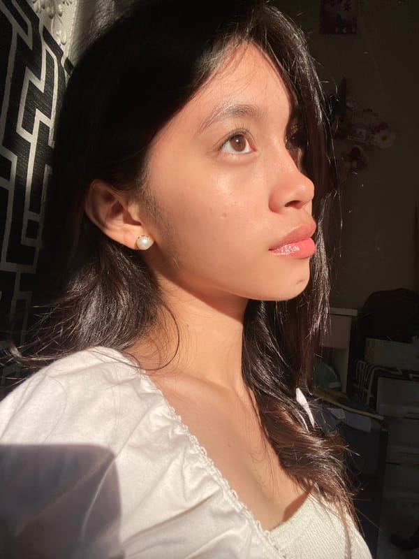 Woman documents makeup session in sunny Panabo room