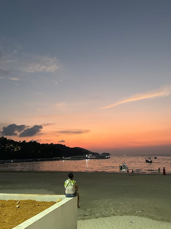 Witness documents tropical scenes across Patong Beach during dusk hours