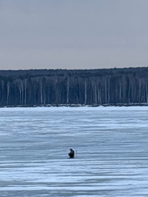 Winter river scenes documented in Chaikovsky, Russia