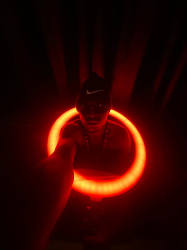 Red ring light portrait session in Abakaliki, Nigeria.