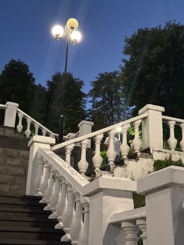 Lamplit stairway at dusk in Endirei, Russia